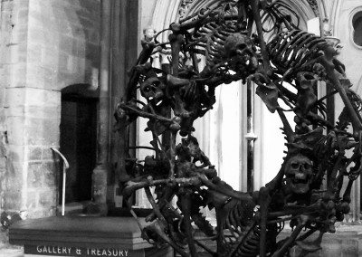 Skulls and bones sculpture at Gloucester Cathedral